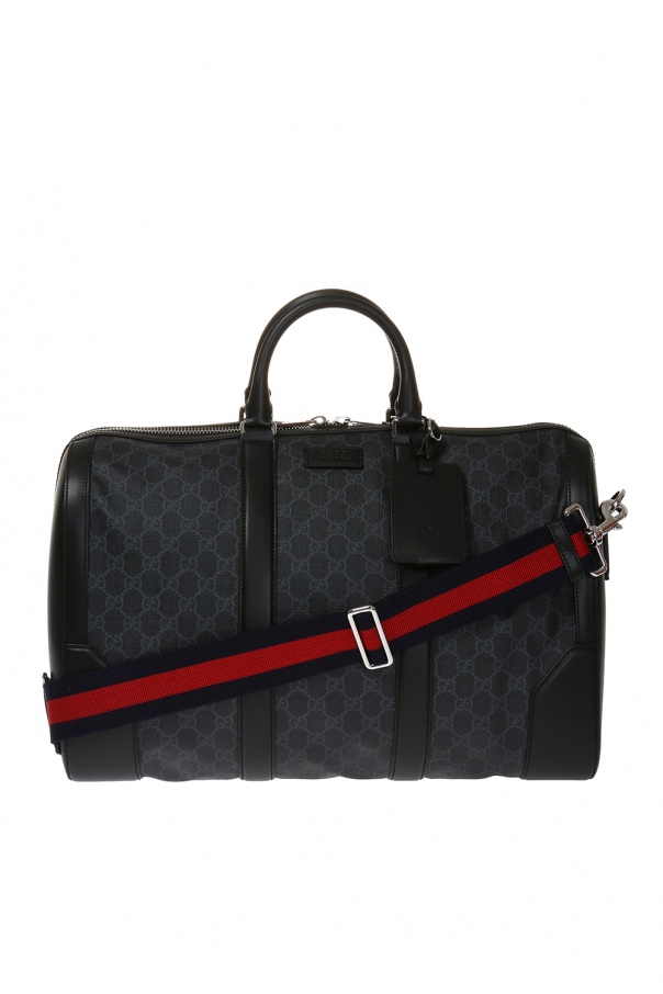 Black GG Supreme holdall bag CDG gucci CDG gucci Women s technical jacket SchaferandweinerShops Rwanda